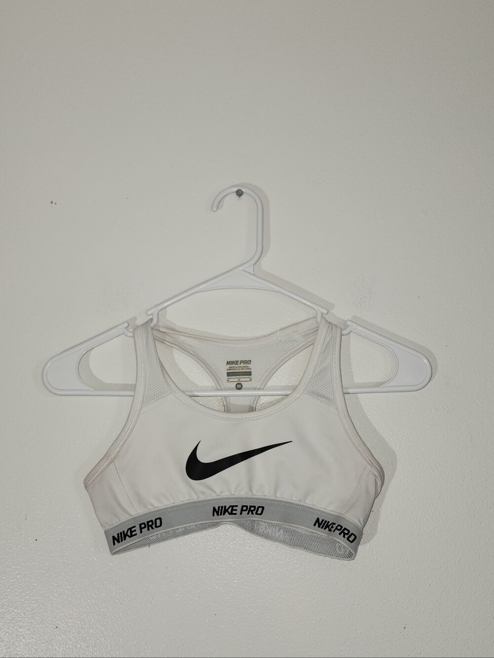 Women's Nike Pro White Sports Bra with Black Swoosh